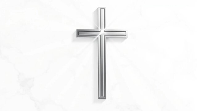 Elegant silver cross with soft glowing light rays on white marble background, spiritual Christian symbol with copy space.