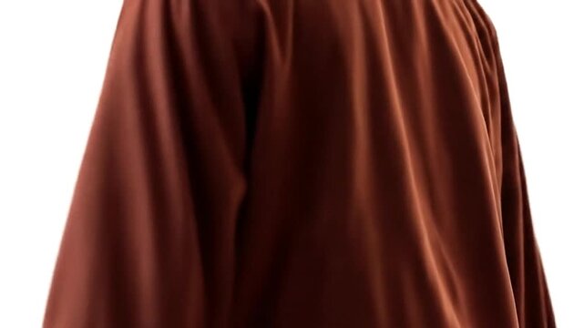 A brown bomber jacket with a silver zipper viewed from the side against a white background