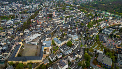 Aerial view around the old town of the city Siegen, Germany on a cloudy spring day