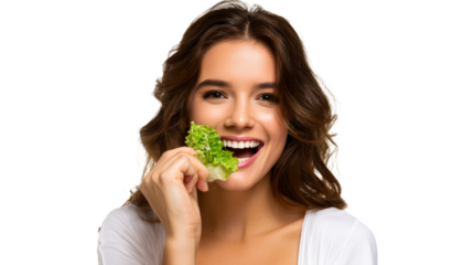 Smiling woman eating fresh lettuce leaf on white, cut out transparent