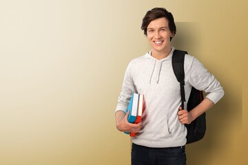Portrait of a smiling young male university student
