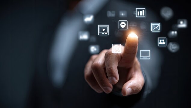 Businessman's finger touches glowing digital icons