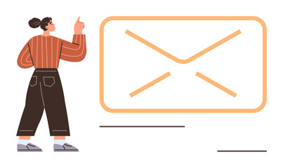 Woman pointing at oversized email envelope, emphasizing messaging, digital connection, and communication. Ideal for email marketing, online communication, messaging, digital services, customer