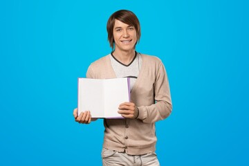 Smiling boy student teenager having success