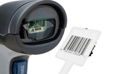 Barcode scanner closeup reading label for retail inventory management, warehouse automation, and product identification solutions