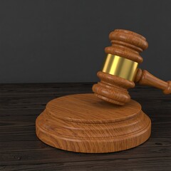 Wooden Gavel and Sounding Block on a Dark Wooden Surface.