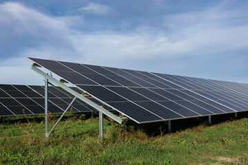 Solar panels providing clean energy under a cloudy sky