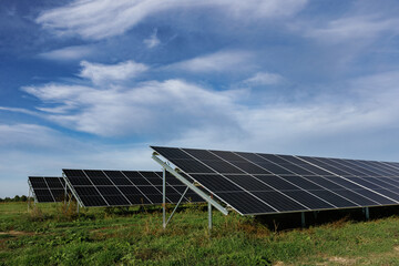 Solar panels providing clean energy under a cloudy sky