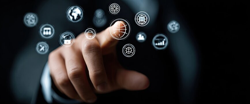 Close-up of a hand touching a digital interface with various business icons