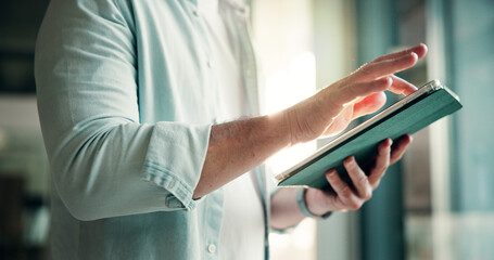 Hands, office and businessman on tablet for finance review, online trading and investment news. Company, scroll and person on digital tech for financial report, budget planning and fintech website