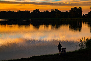 Blue Lake fisherman at sunset