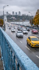 Bright yellow car stands out amidst rain-soaked traffic on a lively city bridge during solo travel