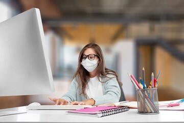 Young girl student learning on computer