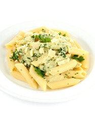 Creamy pasta dish on a white plate