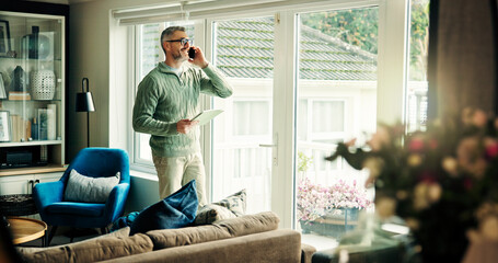 Freelancer, phone call and happy man with tablet in home for listening, chat or insurance policy. Remote work, mobile and mature broker talking to contact for negotiation, claims update or news