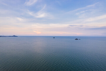 Obraz premium Aerial view of the beautiful seascape with blue sky and clouds in the evening.