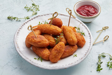 Beetroot croquettes with BBQ tomato sauce