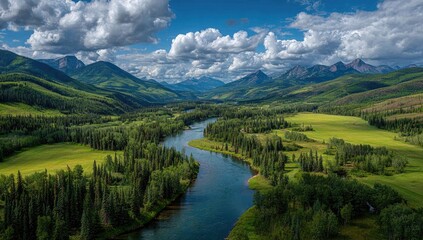 Panoramic view of a winding river valley, lush green meadows, and mountains