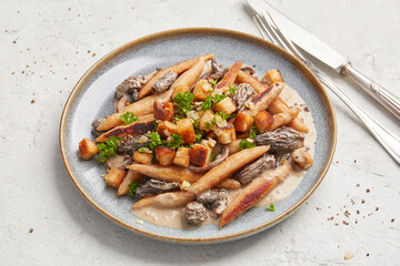 Potato noodles with morel mushroom sauce