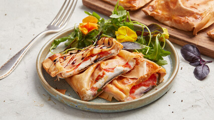 Pastry pockets with tomato and mozzarella