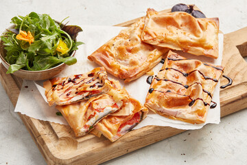 Pastry pockets with tomato and mozzarella