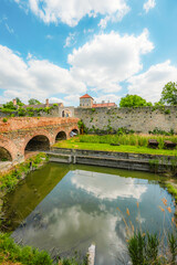 Old stone Tata Castle - 14th-century castle and museum with restored rooms and garden in Tata town, Hungary