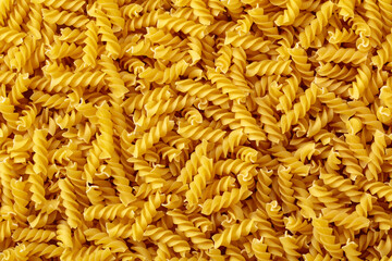 Fusilli doppia rigatura pasta background.