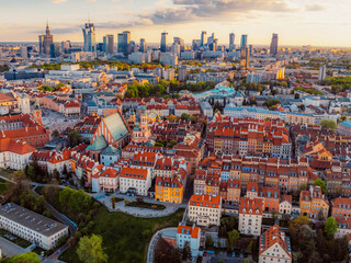 Warsaw old city center and skyscrapers in the background Vistula river. Sunset in Warsaw city center aerial view.