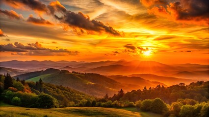 Fototapeta premium Vibrant sunset over rolling hills and mountains