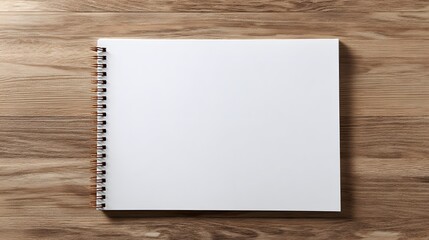 Blank spiral notebook on wooden table.