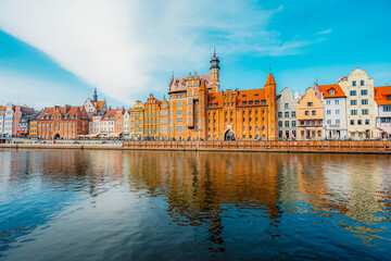 Gdansk with Motlawa river in Poland. Old town colourful house with Holy Spirit Gate