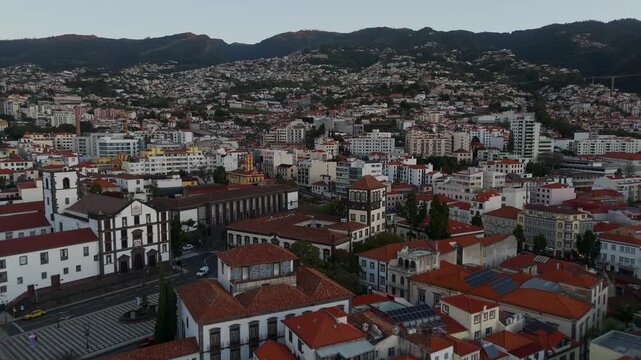 Aerial Drone Shot Approaching Pa&ccedil;os do Concelho, Funchal City Hall, in Funchal, Madeira, Portugal at Sunrise.