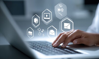 Hands typing on a laptop with digital interface icons