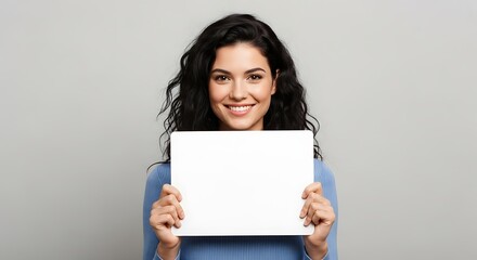 Naklejka premium Smiling Woman Holding Blank White Board.