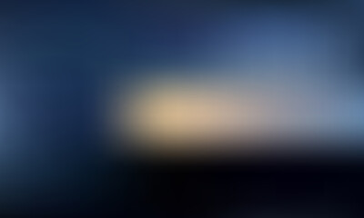 Soft focus abstract background with a warm glow on a dark blue canvas.