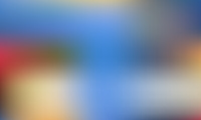 Soft, colorful abstract background with blended hues of blue, yellow, and red