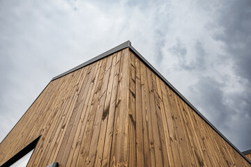 Modern Wooden House Corner with Vertical Timber Cladding