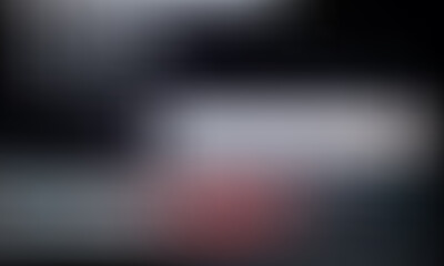 Abstract blend of dark and light colors creating a moody, sophisticated background.