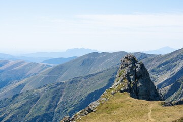 Fototapeta premium Majestic mountain range under clear sky