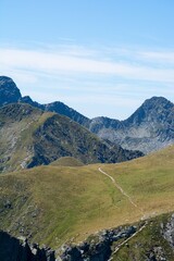 Fototapeta premium Scenic Mountain View with Winding Trail