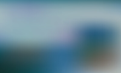 Abstract cool blue and green bokeh background with soft light