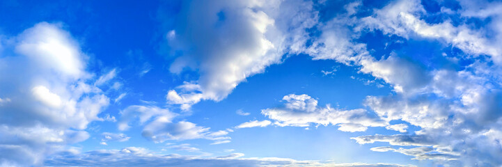 A cloudy afternoon, and the sun is covered by clouds and leaves its rays behind
