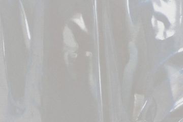 plastic overlay texture of realistic crumpled transparent plastic film wrap on black background