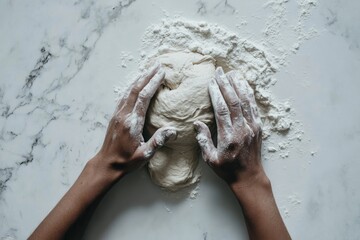 Hands skillfully kneading fresh dough creating culinary magic on a marble surface with flour