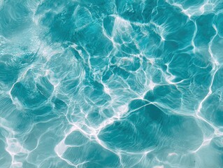 Obraz premium Abstract turquoise water surface with light reflections