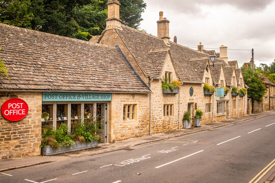 BIBURY, COTSWOLDS-  Eleven cafe and Post  Office in Bibury village in the Cotswolds, famous for quaint stone buildings and popular with tourists.