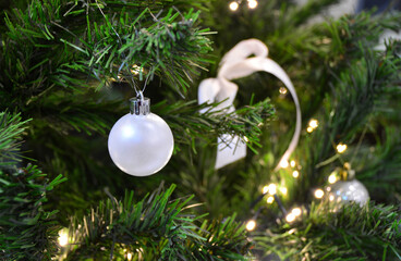 Christmas Ornament on a Decorated Tree christmas background