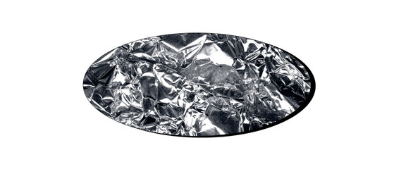An oval shape filled with crumpled silver foil, reflecting light and creating a textured, metallic...