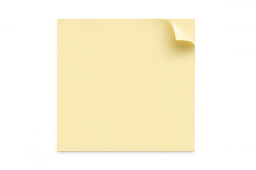 Yellow sticky note with curled edge, resting on clear surface, offering clean workspace for quick notes or memory aid