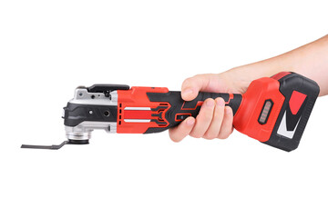 Worker holding cordless renovator tool ideal for performing detailed cutting isolated on white background.